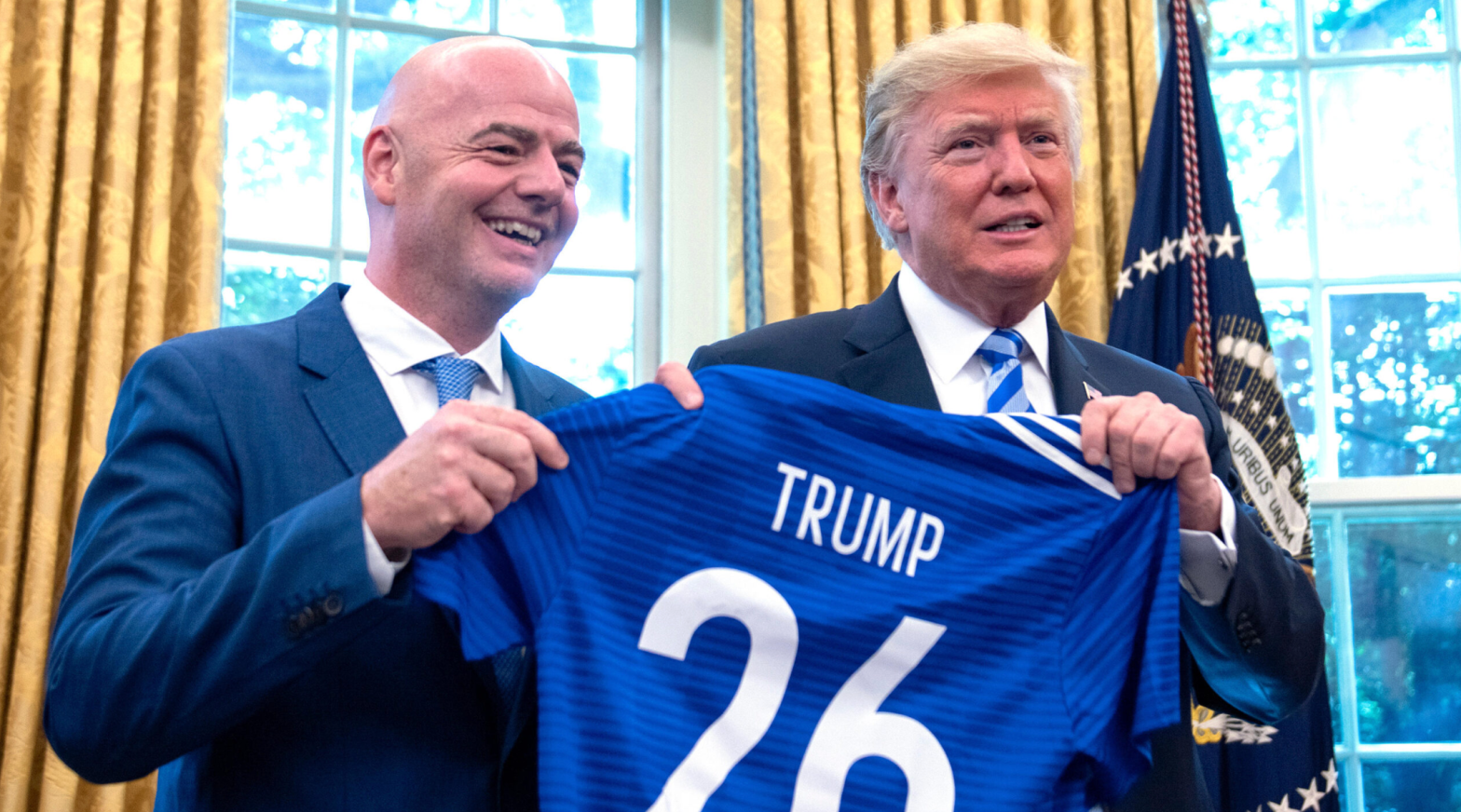 Donald Trump and Gianni Infantino at the White House in 2018 celebrating the 2026 World Cup